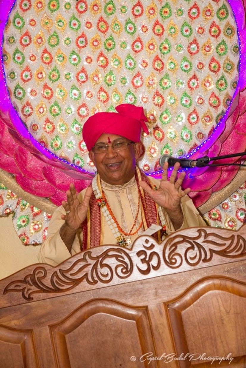 Pundit Ravindranath Maharaj speaking at a religious gathering